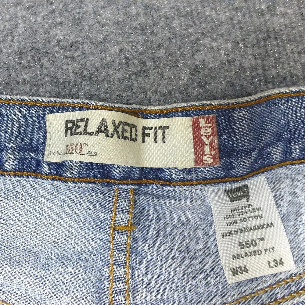 90's Levis 550 Relaxed Fit Jeans Mens 34x34 Light Wash Blue Denim